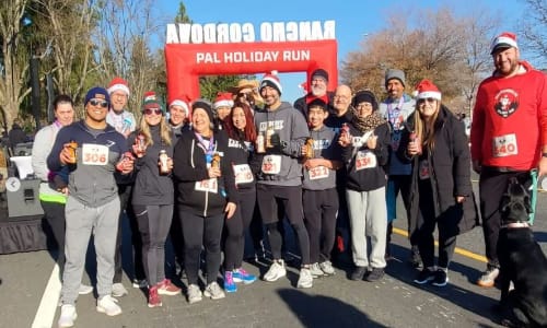 Group of runners posing at race start