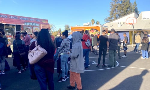 Crowd of people outside the Youth Center.