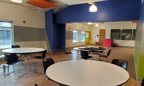 Group tables in the Youth Center.